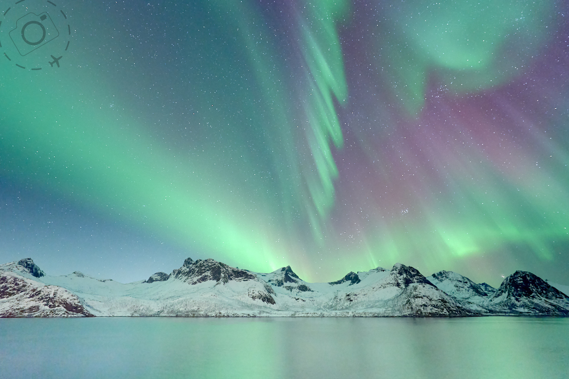 Aurora Borealis dancing over a Scandinavian landscape